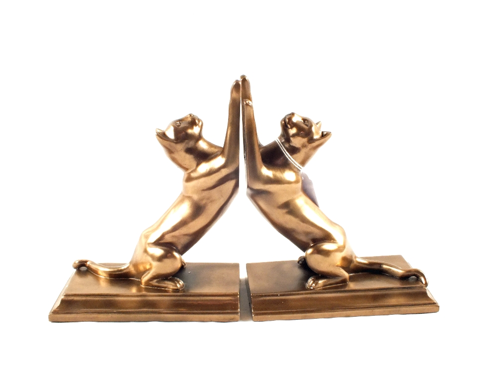 A pair of bronzed Cat bookends,