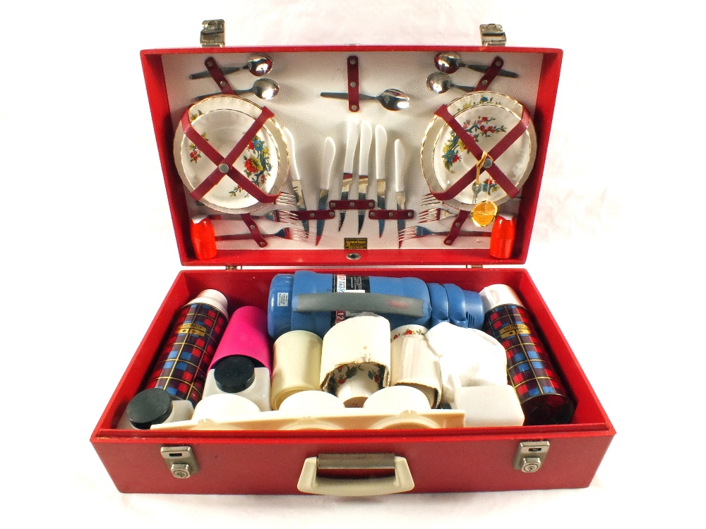 A Brexton red fully fitted picnic case
