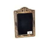 A Silver photo frame with ribbon decoration,