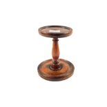 A 19th Century turned Mahogany candle stand