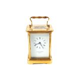 A Brass cased carriage clock by Matthew Norman,