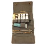 A leather cased medical kit by Finnegans,