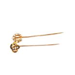 A Gold Diamond and Pearl horseshoe shaped stick pin,