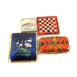 A lady's cigarette case with flamingo decoration and three compacts