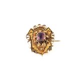 An unusual Gold brooch/clip with black enamelling detail set with Amethyst and Seed Pearls
