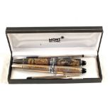 Two Mont Blanc pens with gold metal decoration