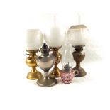 Five various oil lamps