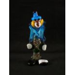 A Murano glass clown with blue hat and coat