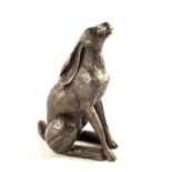 A bronzed figure of a Hare moongazing,