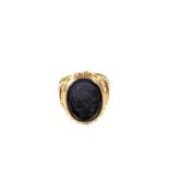 A gents 9ct Gold intaglio set ring with carved image of head,