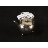 A Silver miniature kettle,