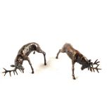 A pair of miniature solid Bronze figures of a Ruttling Stag,