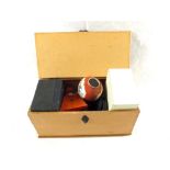 A Pine Teachers Whiskey box containing metronome,