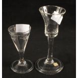 A Georgian wine glass with bell shaped bowl, plain stem and folded foot,