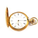 An 18ct Gold lady's hunter pocket watch with engraved detail to front and back case (monogram on