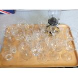 Various cut wine glasses and a glass oil lamp