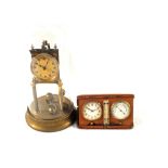 A dome clock plus a travelling clock and a barometer set