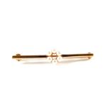 A 9ct Gold Pearl set bar brooch