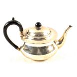 A Silver teapot,