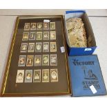 A shoebox and two framed sets of cigarette cards plus a stamp album