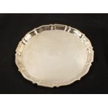 A Gorham shaped Silver salver with monogram and original bag