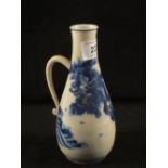 A Japanese blue and white dragon decorated jug,