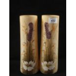 A pair of Victorian opal glass floral painted vases