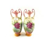 A pair of Edwardian porcelain floral vases