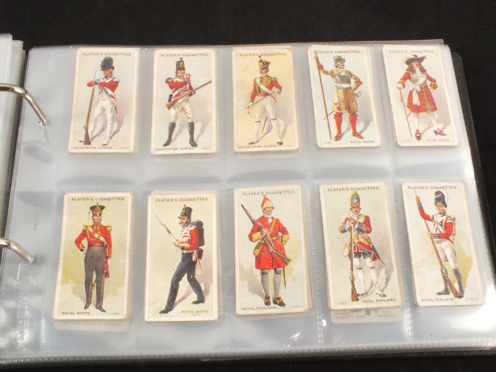 An album of various cigarette cards