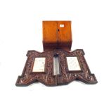 A pair of Oak picture frames carved with leaf decoration plus a stationery cabinet with a single