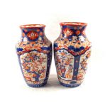 A pair of 19th Century Imari floral vases,