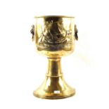 An Arts and Crafts Brass jardinière with embossed galleon,