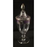 A purple banded glass lidded urn with Silver cladding