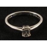 An 18ct White Gold Emerald cut solitaire Diamond ring,