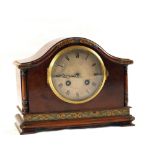 An Edwardian Walnut striking mantel clock