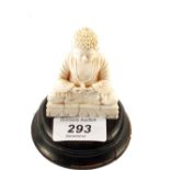 A Chinese Ivory figure of a seated Buddha,