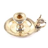 An oval Greek Silver chamberstick,