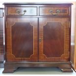 A reproduction Mahogany cabinet and CD cabinet