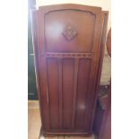 An Oak single door wardrobe,