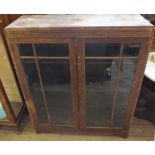 A Victorian Mahogany two door bookcase and 1930's Oak bookcase