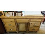 A Victorian Pine kitchen sideboard with seven drawers and one cupboard