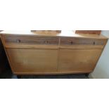 A contemporary Russell's of Broadway light Oak sideboard with darker wood drawers and drop down