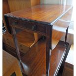 A 19th Century Mahogany Pembroke table on square tapered legs