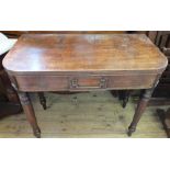 A 19th Century Mahogany folding top tea table on turned legs