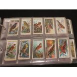 An album of sets and part sets of cigarette cards