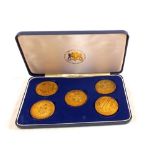 A cased set of five Silver gilt coins celebrating the 1900th Anniversary of York,