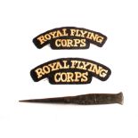 A pair of shoulder titles marked Royal Flying corps with an aerial dart