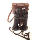A pair of 1934 (dated) Barr and Stroud binoculars with leather case