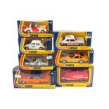 A boxed Corgi 437 Coco Cola van, 411 Mercedes taxi, 509 Porsche Targa Police car,