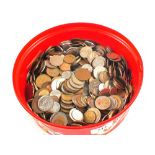 A tub of mixed world coins